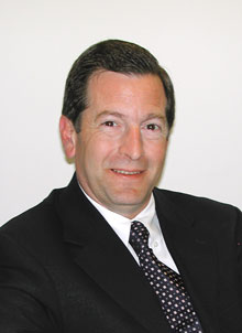 Carlozzi, of Integra, Dies At 56
