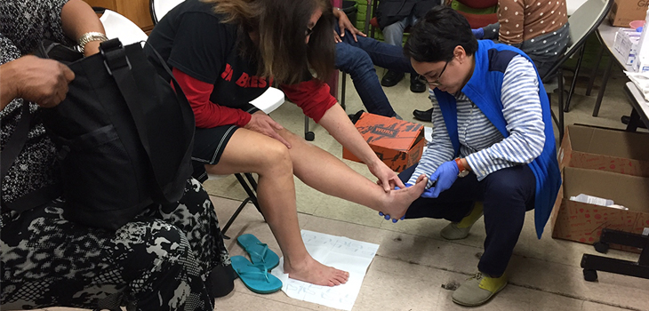 Rush Physicians Provide Shoes, Foot Care to Homeless