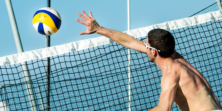 Volleyball vs. Swimming in the Battle of the Overhead Athlete